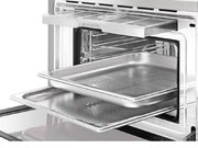 Компактный духовой шкаф с пароваркой Smeg SF4750VCBS фото 4 в Краснодаре