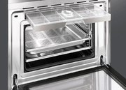 Компактный духовой шкаф с пароваркой Smeg SF4920VCX фото 3 в Краснодаре