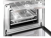 Компактный духовой шкаф с пароваркой Smeg SF4750VCBS фото 2 в Краснодаре