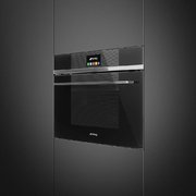 Компактный духовой шкаф с пароваркой Smeg SF4104VCN фото 2 в Краснодаре